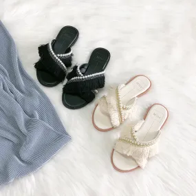 BOOPDO DESIGN CROSS OVER FLAT SANDALS WITH TASSEL AND PEARL DETAIL