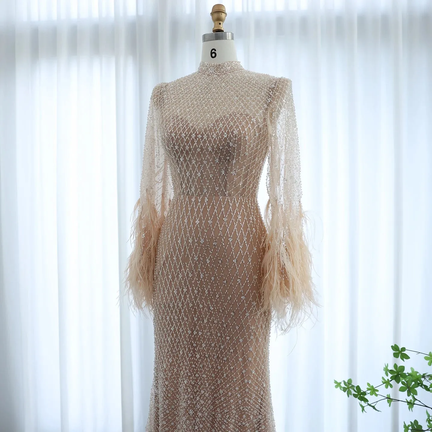 Feather Embellished Evening Gown with Long Sleeves